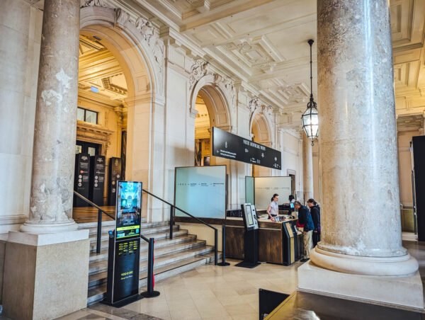 Welmuseum ticket desk / entrance lobby; lockers may be visible at far left